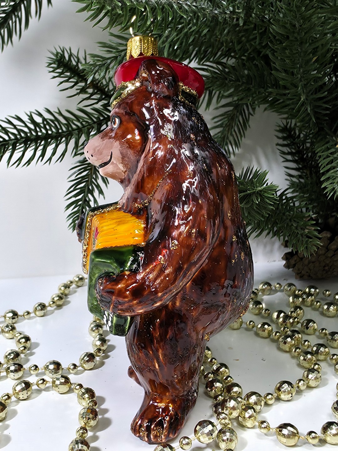 фото Стеклянная елочная игрушка Мишка с гармошкой