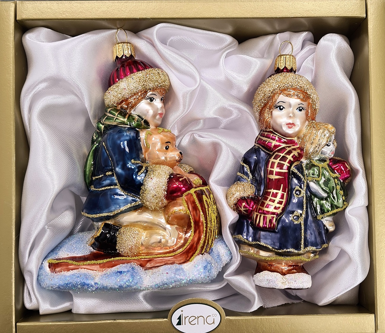 фото Набор ёлочных игрушек Девочка с куклой и мальчик на санках синие