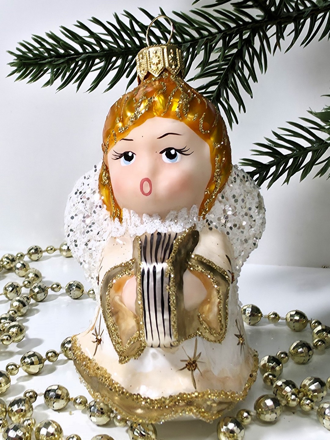 фото Стеклянная елочная игрушка Ангел с книгой