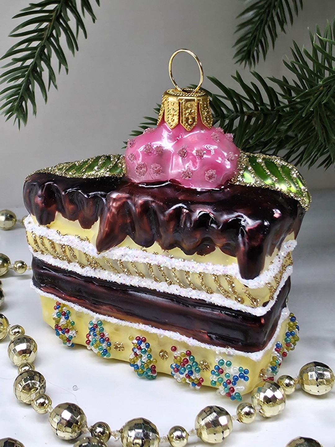 фото Стеклянная елочная игрушка Кусок торта