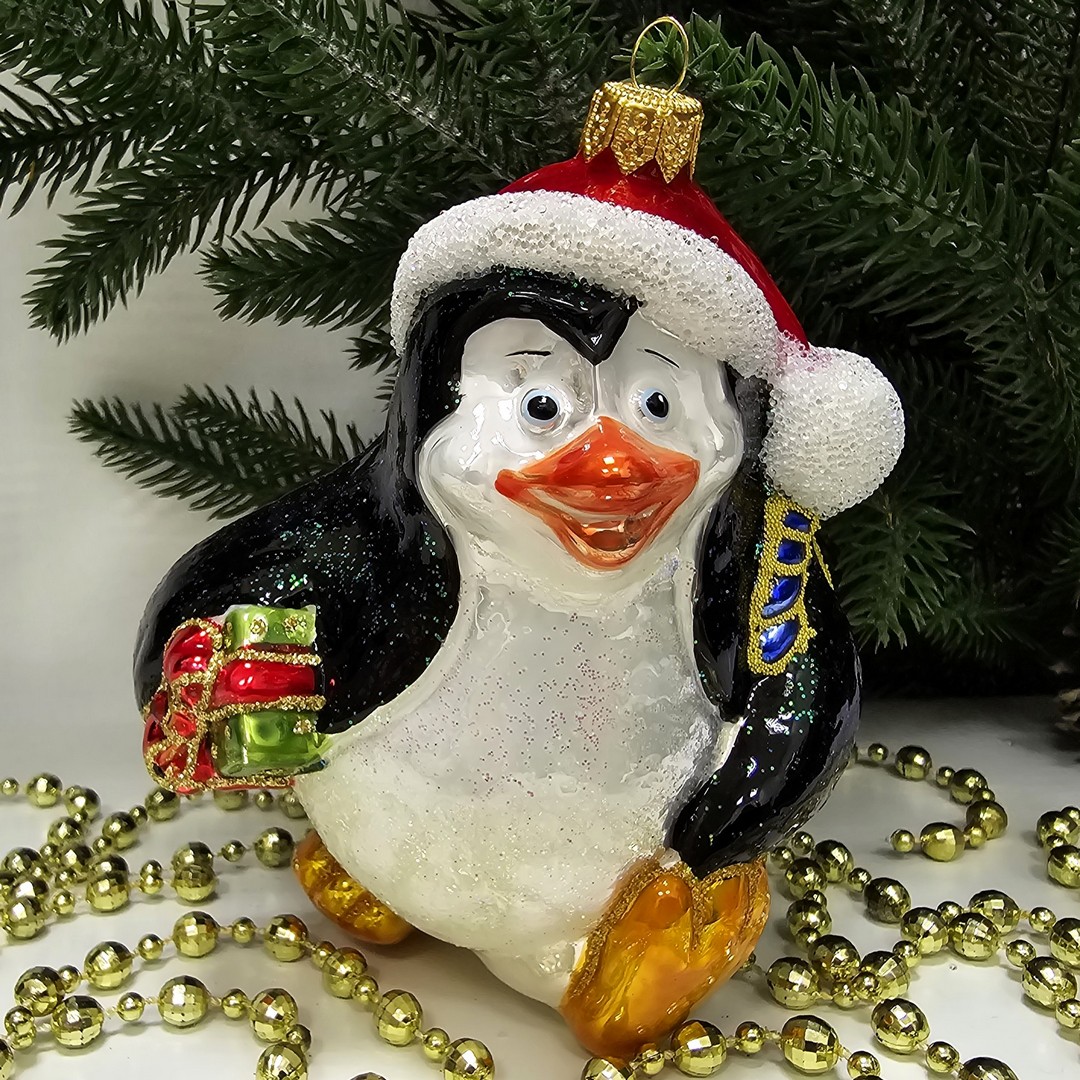 фото Стеклянная елочная игрушка Пингвин с подарком