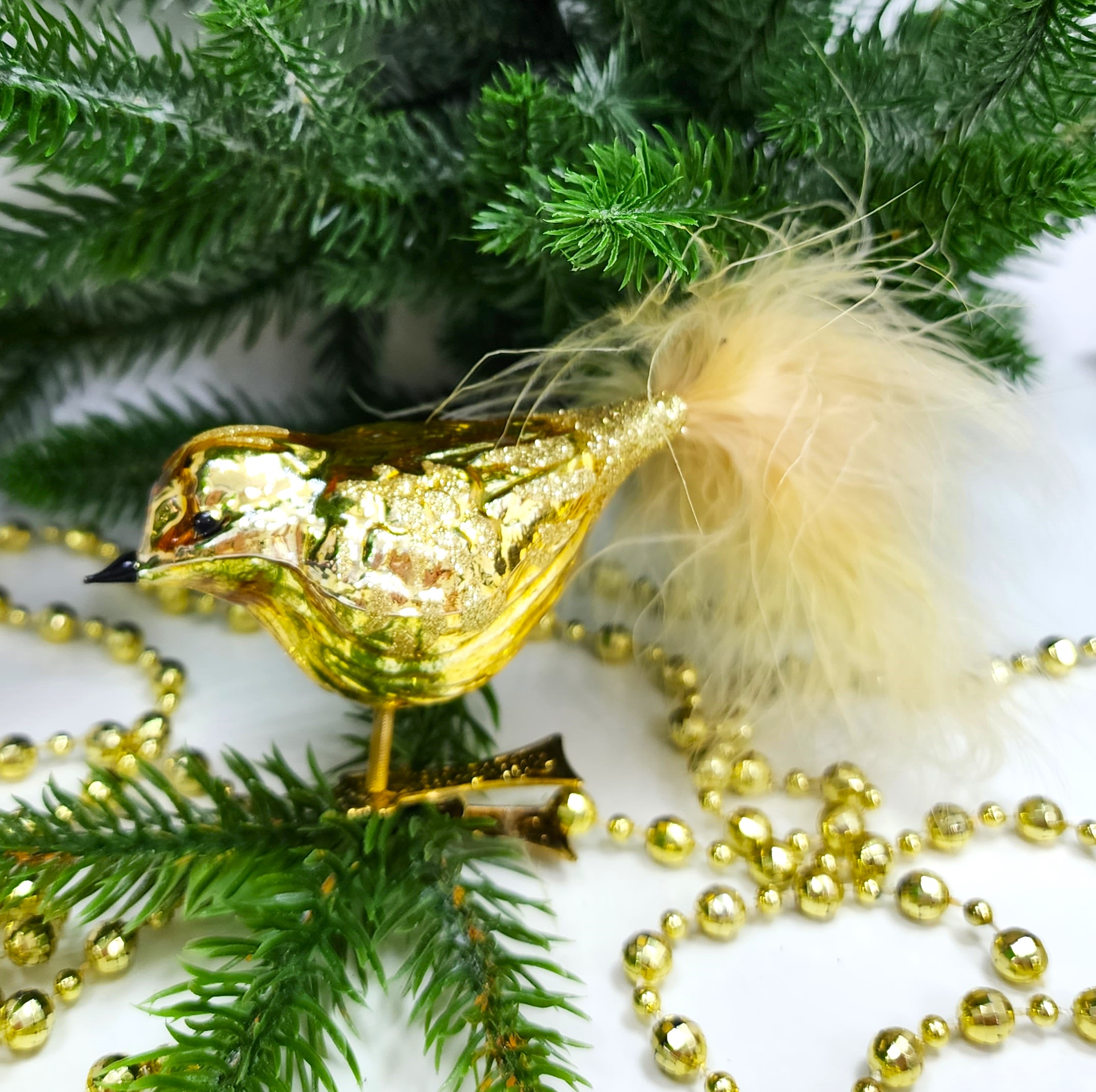 фото Стеклянная елочная игрушка Птичка на прищепке золотая