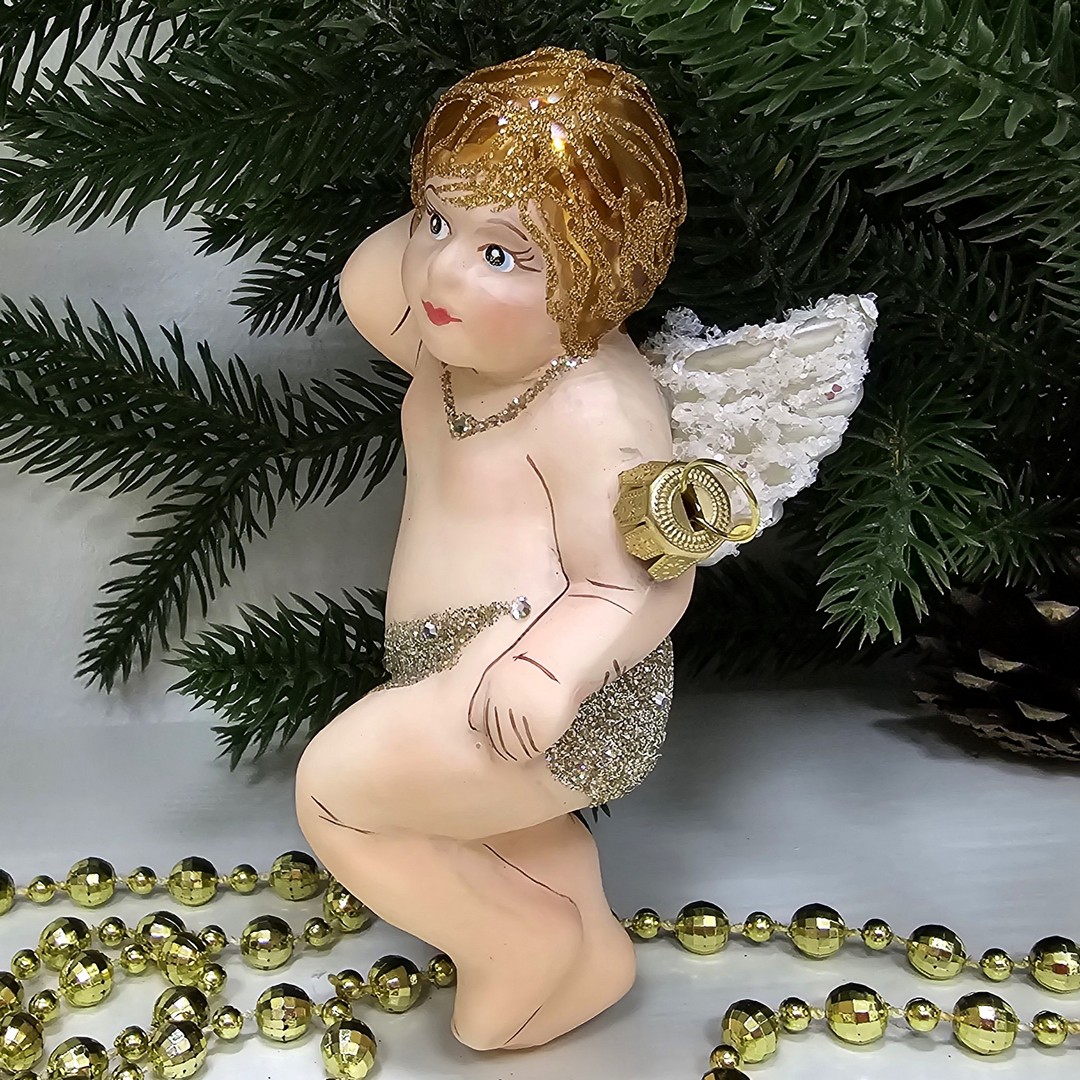 фото Стеклянная елочная игрушка Ангел лежит