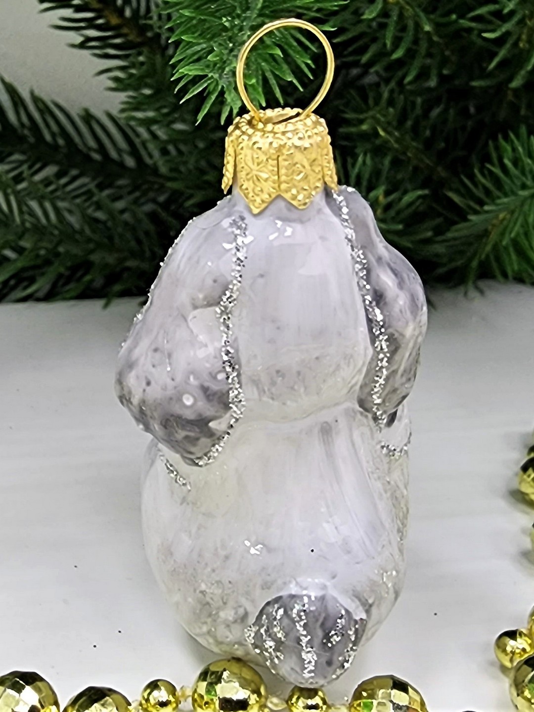 фото Стеклянная елочная игрушка Зайка с морковкой