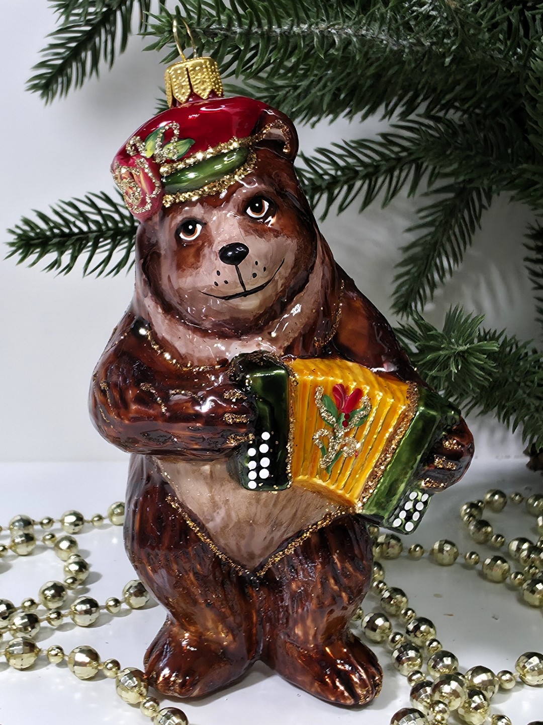 фото Стеклянная елочная игрушка Мишка с гармошкой