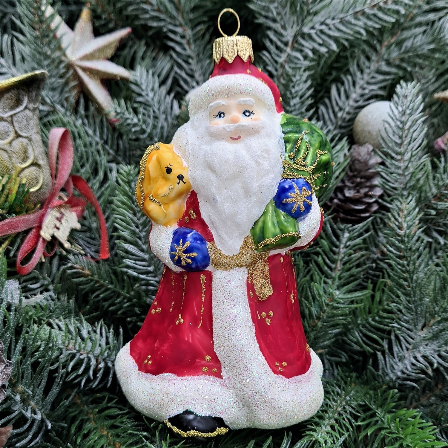 фото Стеклянная елочная игрушка Дед Мороз с белкой