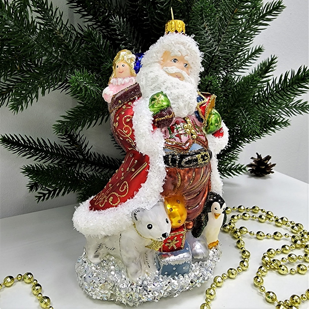 фото Стеклянная елочная игрушка Дед Мороз с пингвинами