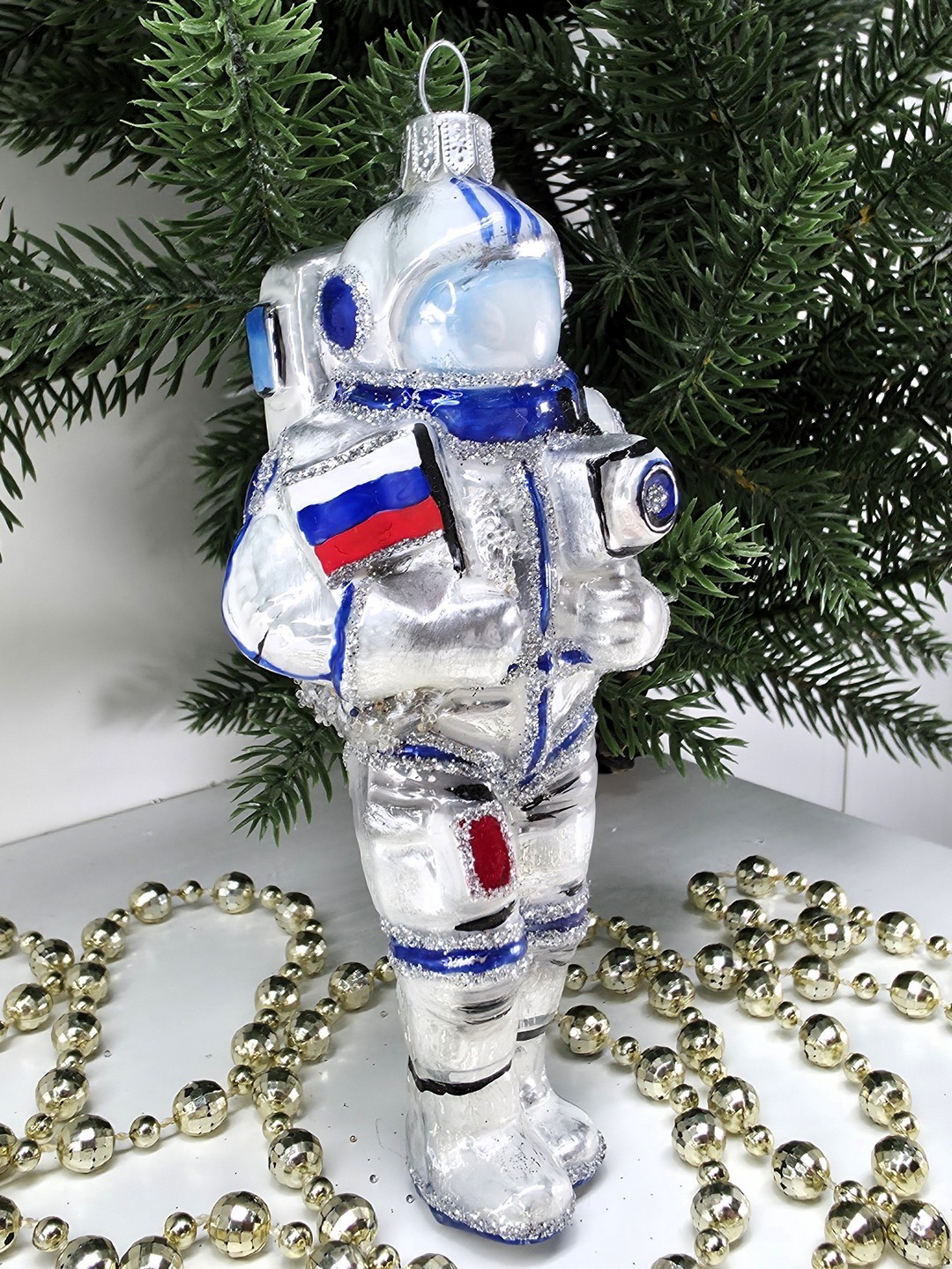 фото Стеклянная елочная игрушка Космонавт